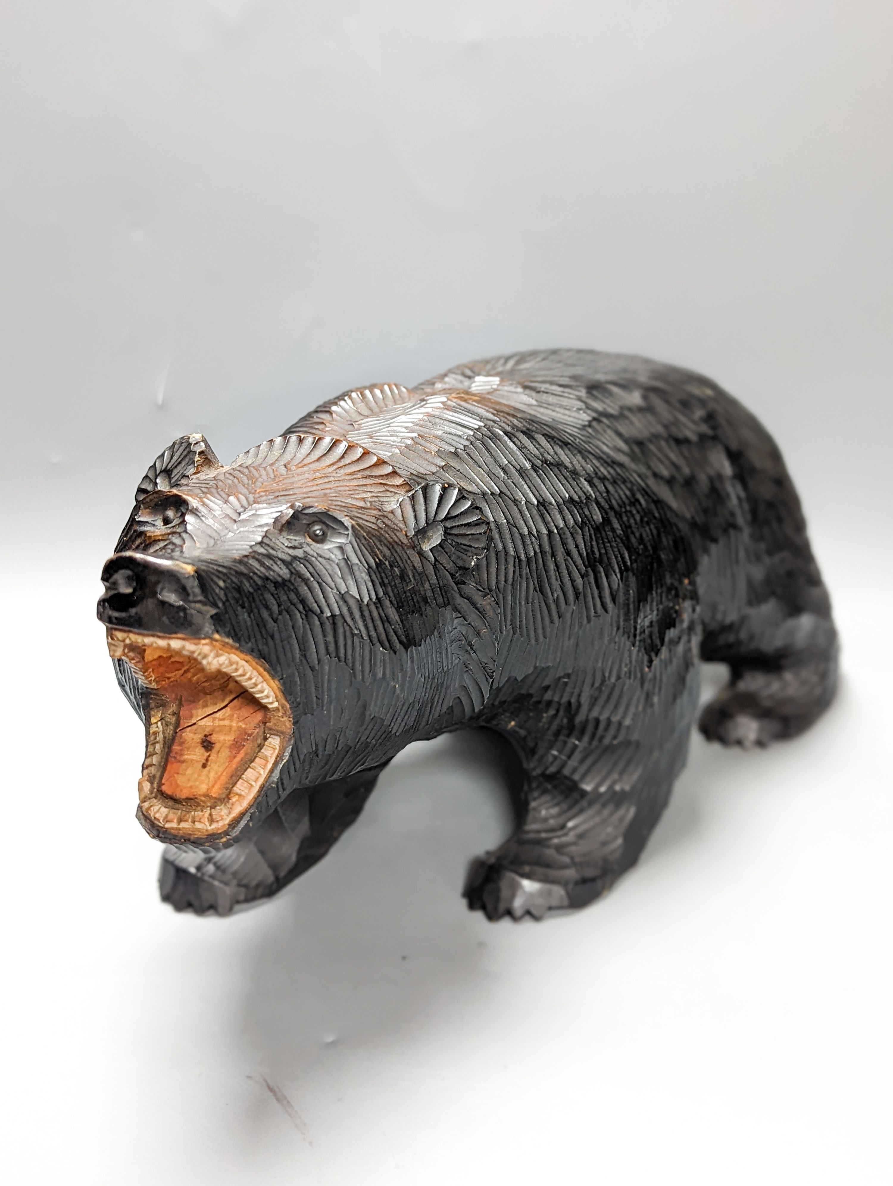 A Black Forest style carved bear 45cm